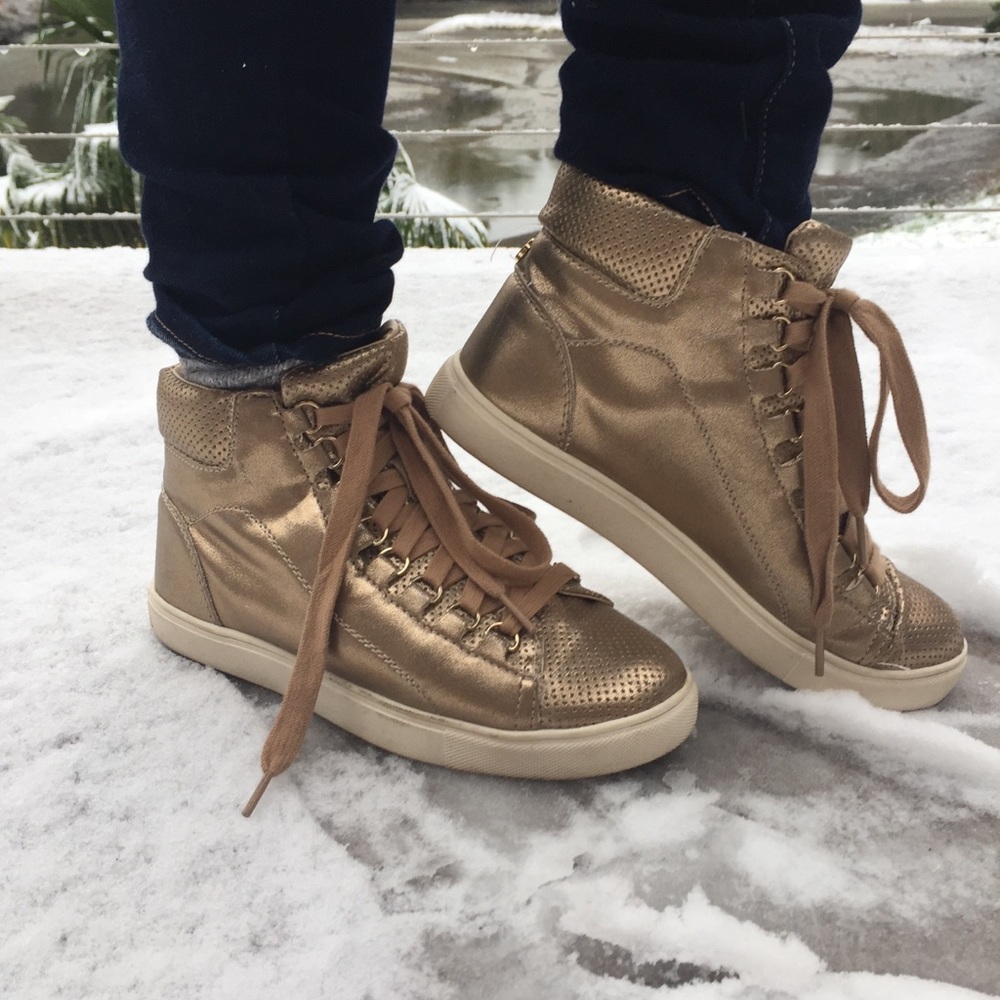 Gold Steve Madden high top fashion sneakers